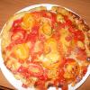 Pizza ai peperoni rossi e gialli